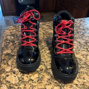 Sketchers black parent leather boots